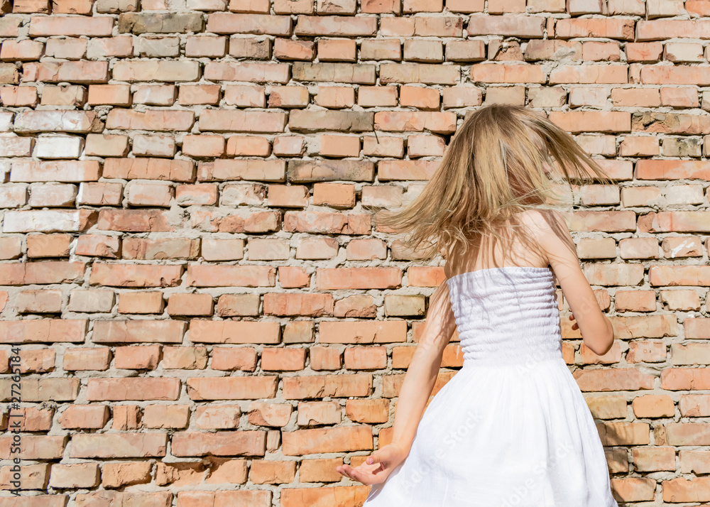 Teen girl in white summer dress