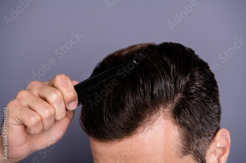 Cropped close up top above high angle photo amazing he him his macho hands arms plastic hair styling brush take care hairdo barber shop stylist visit wear casual white t-shirt isolated grey background