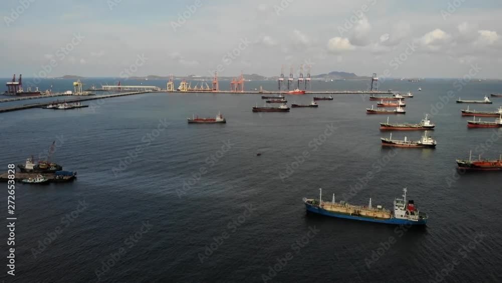 Aerial view of ships carrying fuel&Gas or anything from petrochemicals In the sea port For energy export and import business. Aerial view of ships carrying fuel&Gas or anything from petrochemicals In the sea port For energy export and import business.