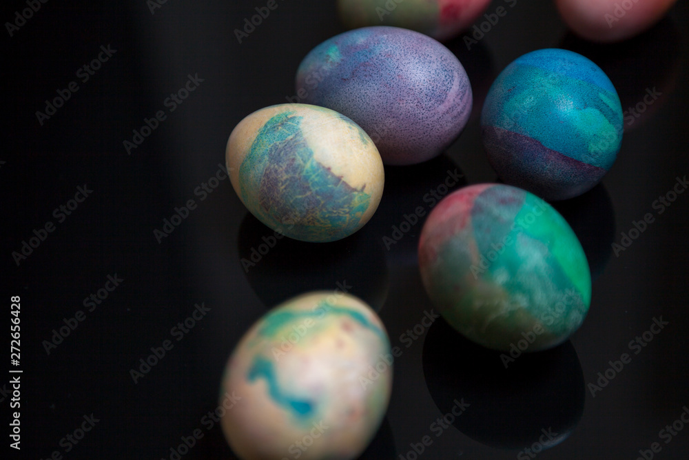 Group of easter painted eggs on black background Group of easter painted eggs on black background