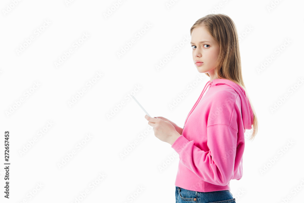 side view of sad teenage girl using digital tablet isolated on white side view of sad teenage girl using digital tablet isolated on white