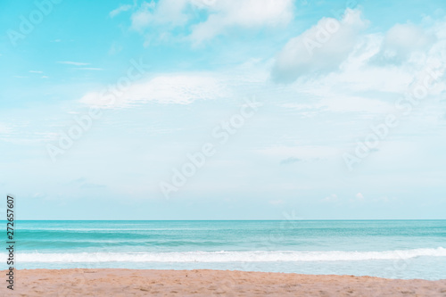 Tropical nature clean beach and white sand in summer with sun light blue sky and bokeh background.