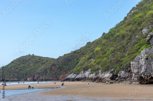 Khao Kalok mountain at Pranburi beach with blue sky Prachuap Khiri Khan, Thailand. travel and natural concept.