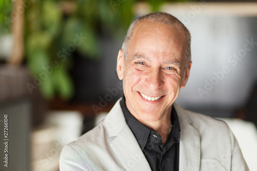 Portrait Of A Mature Man Smiling At The Camera. Elderly happy man.