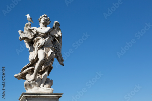 One of the angels at the famous Sant Angelo bridge, Rome, Italy.