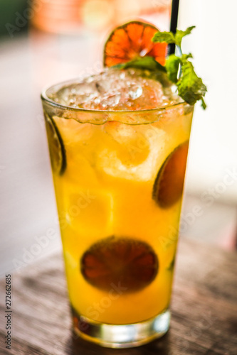 Vodka or rum with homemade falernum, ginger beer and passionfruit in a tall glass
