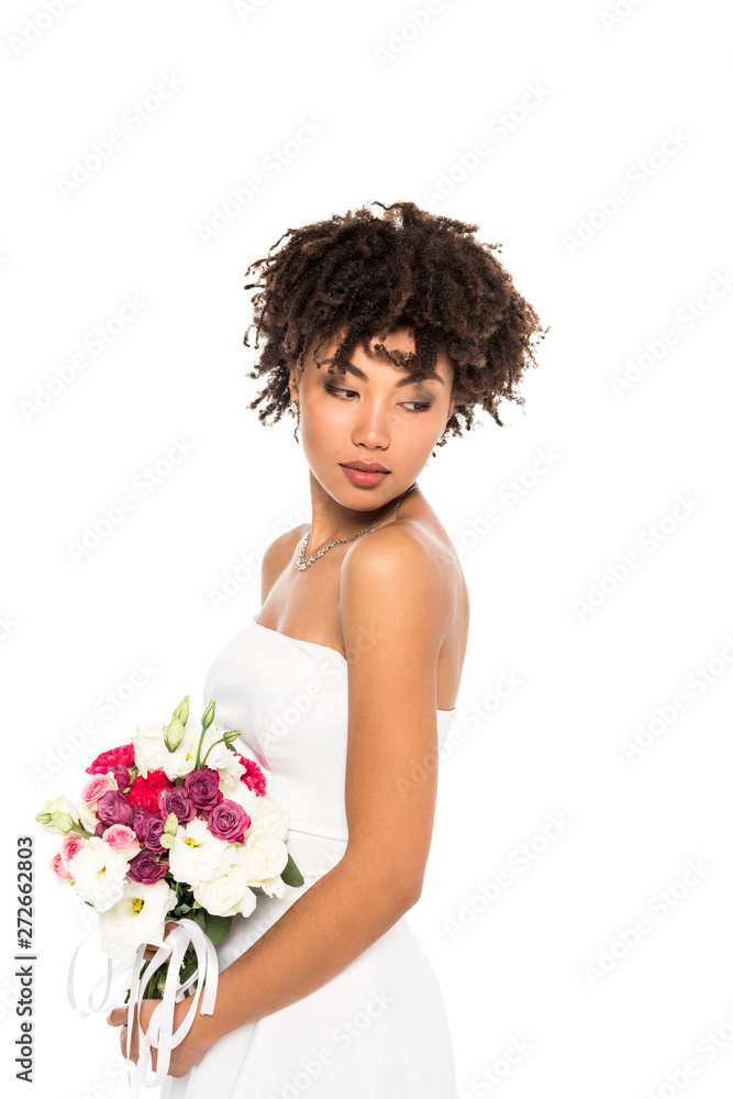 beautiful african american girl in wedding dress holding bouquet isolated on white