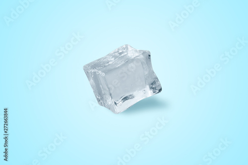 ice cube over blue light background
