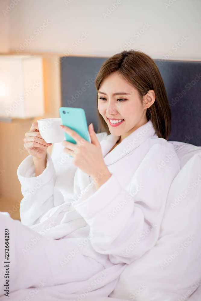 woman use smartphone with coffee woman use smartphone with coffee