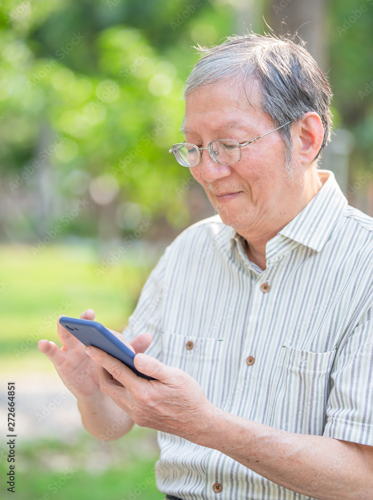 Older man use cellphone Older man use cellphone