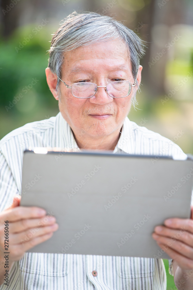 Older man use tablet Older man use tablet