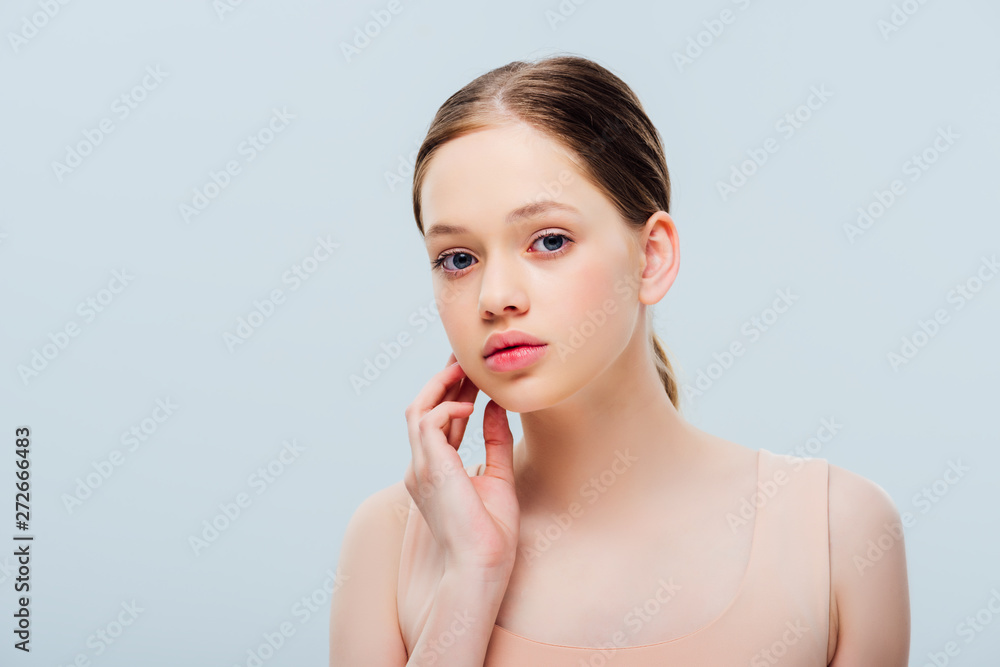 upset teenage girl looking at camera isolated on grey upset teenage girl looking at camera isolated on grey