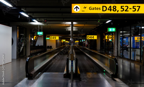 Gates in Schiphol airport Amsterdam at night photo