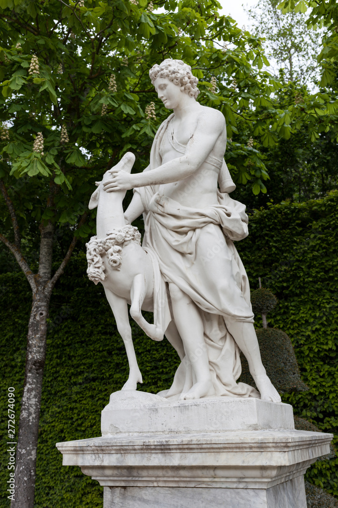 Marble statue of a young man with a deer