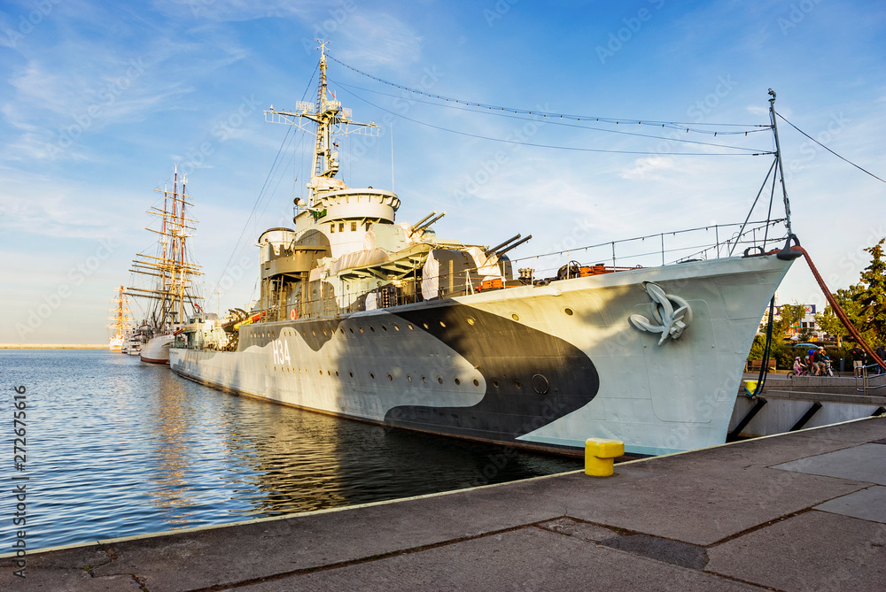 Fototapeta premium Sailboat and ship in harbor Gdynia