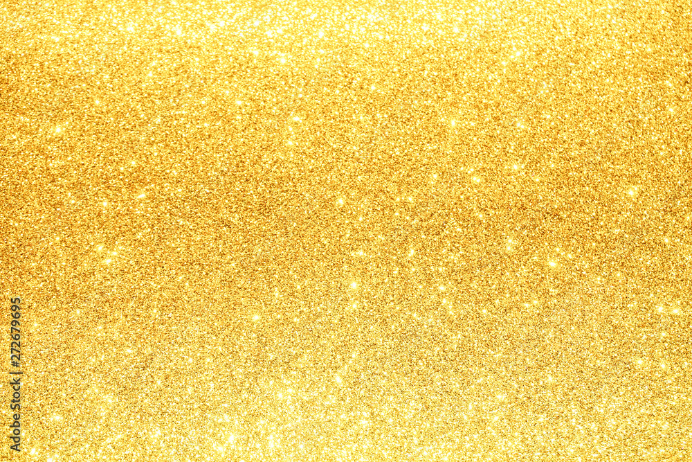 gold Sparkling Lights Festive background with texture. Abstract Christmas twinkled bright bokeh defocused and Falling stars. Winter Card or invitation