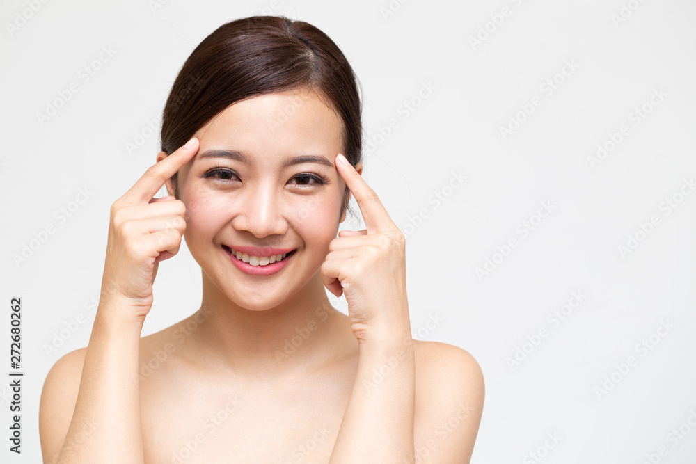 Happy beautiful young Asian woman with clean fresh skin, Girl beauty face care, Facial treatment and cosmetology spa concept Happy beautiful young Asian woman with clean fresh skin, Girl beauty face care, Facial treatment and cosmetology spa concept