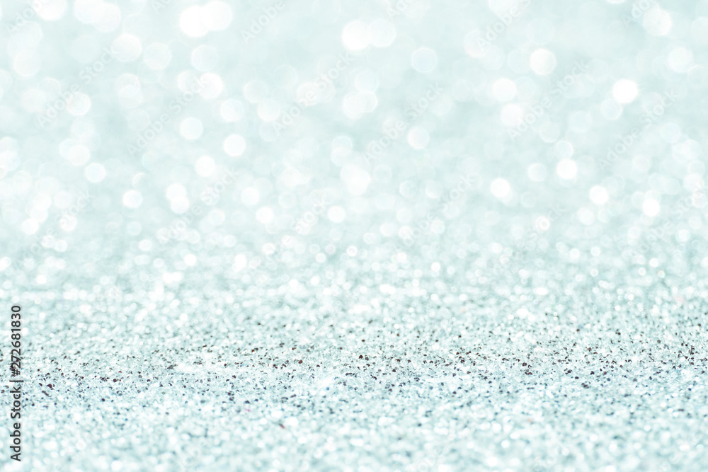 silver Sparkling Lights Festive background with texture. Abstract Christmas twinkled bright bokeh defocused and Falling stars. Winter Card or invitation silver Sparkling Lights Festive background with texture. Abstract Christmas twinkled bright bokeh defocused and Falling stars. Winter Card or invitation