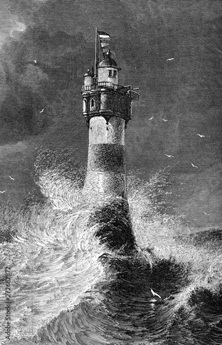 Roter Sand Lighthouse in a tempest in the North Sea on the Weser river estuary, Germany, built in 1885 directly on the sea floor