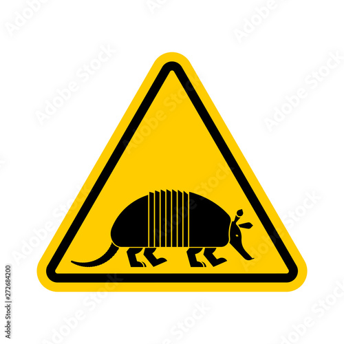 Attention armadillo. Caution Nine-hip Armadillo. Yellow triangle road sign