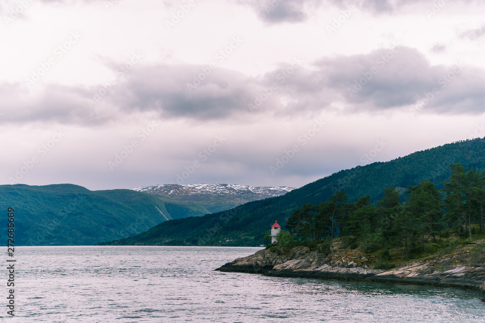 Lighthouse in Norwegian fjords