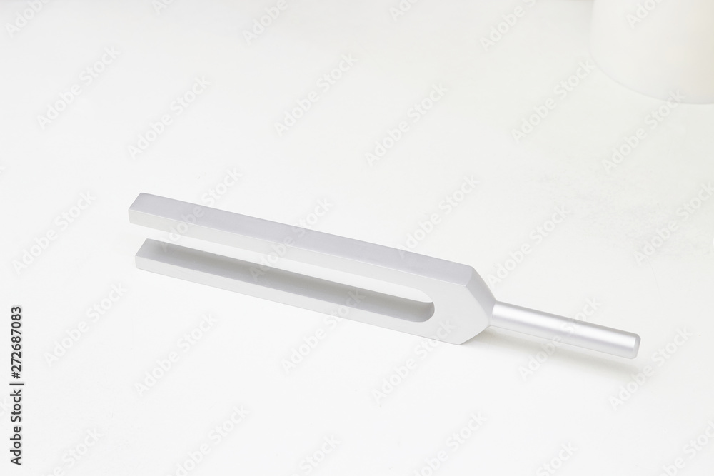 Tuning fork side arrangement on white isolated background Tuning fork side arrangement on white isolated background
