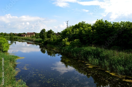 river and reflection in it