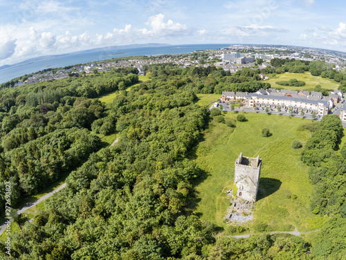 Fotografie Aerial view of Merlin Castle ruins in Merlin Park with city in background