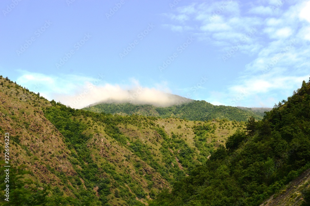 Obraz premium landscape of the hills in the clouds
