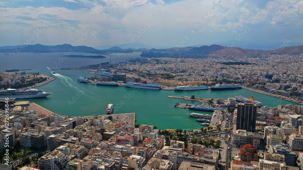 Aerial panoramic view of famous port of Piraeus one of the largest and busiest in Mediterranean sea where passenger ships travel to Aegean destinations, Attica, Greece