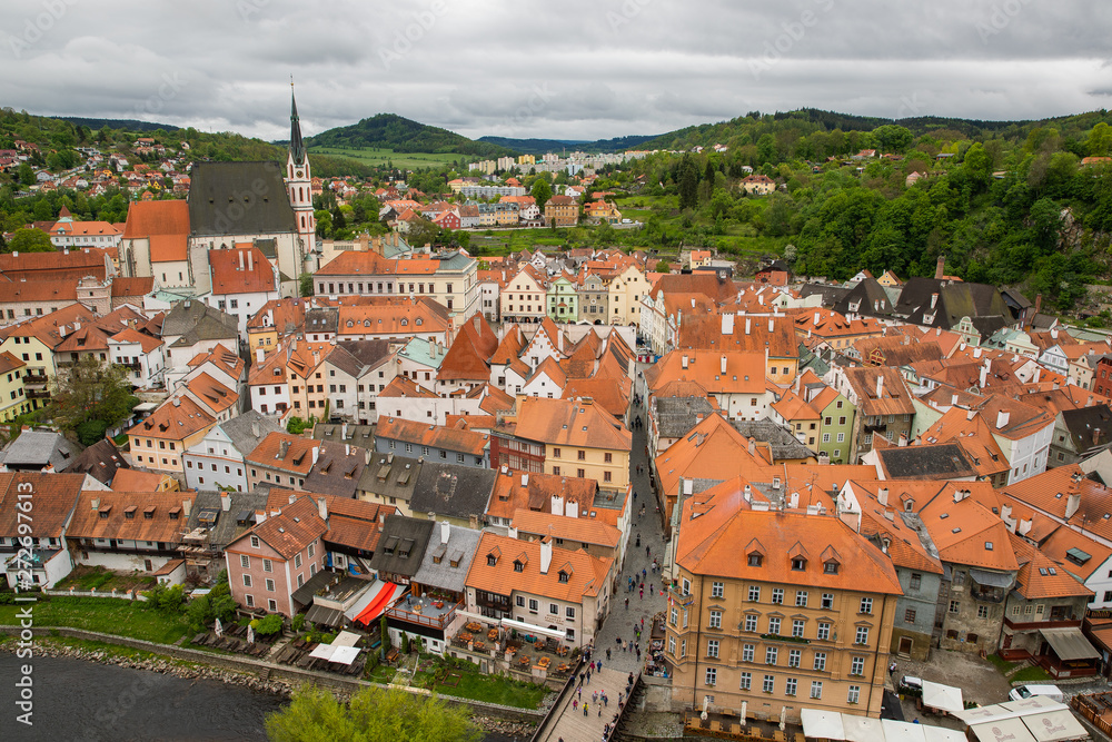 Panoramic landscape view above from aerial of the historic city of Cesky Krumlov with famous Cesky Krumlov Castle, Church city is on a UNESCO World Heritage Site captured during the spring