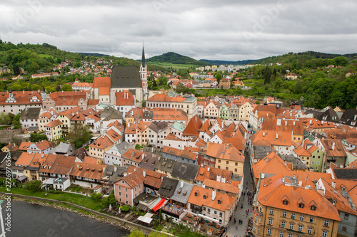 Panoramic landscape view above from aerial of the historic city of Cesky Krumlov with famous Cesky Krumlov Castle, Church city is on a UNESCO World Heritage Site captured during the spring