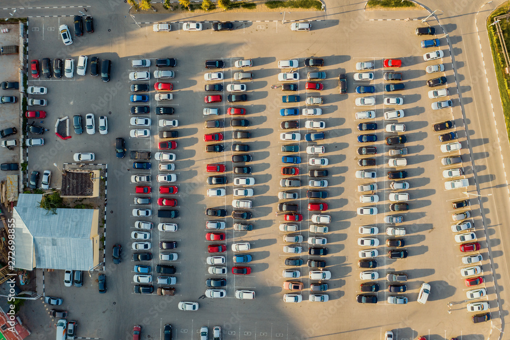 Parking lot with rows of cars, aerial top view Parking lot with rows of cars, aerial top view