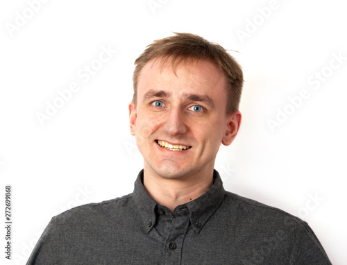 Young man smiling portrait on white background