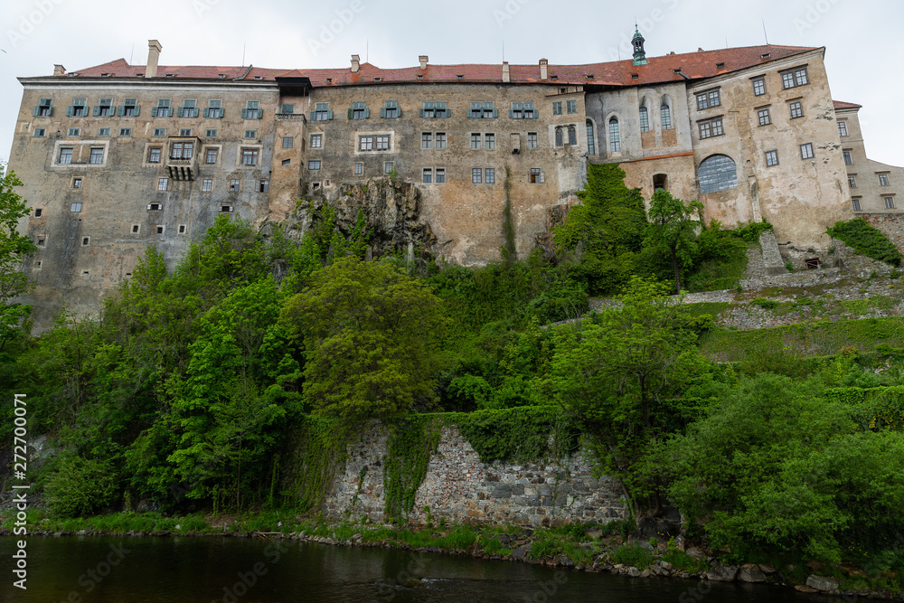 Panoramic landscape view of the historic city of Cesky Krumlov during day time with famous Cesky Krumlov Castle, Church city is on a UNESCO World Heritage Site captured during spring