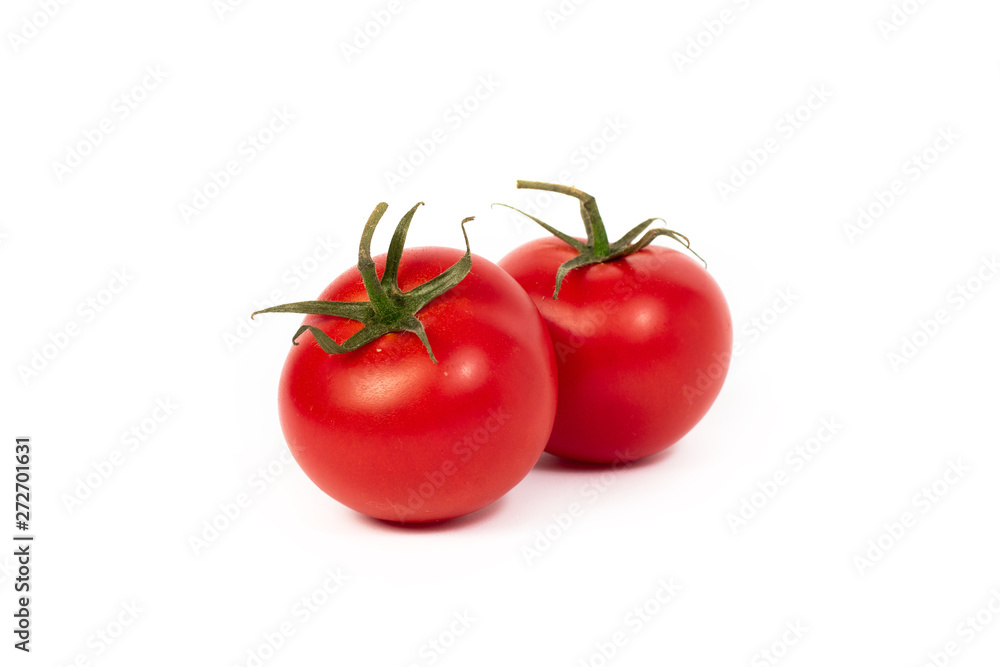 Red tomatoes on a white background. A group of tomatoes with herbs on a white background. Red tomatoes on a white background. A group of tomatoes with herbs on a white background.