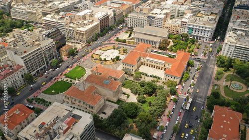 Aerial photo of famous landmark buildings of Academy of Athens, Panepistimio and public Library, Athens, Attica, Greece