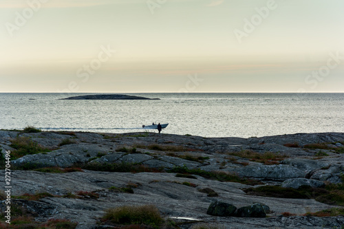 silhouette of tourist witnessing sunset near foto island gothenburg archipeloga sweden