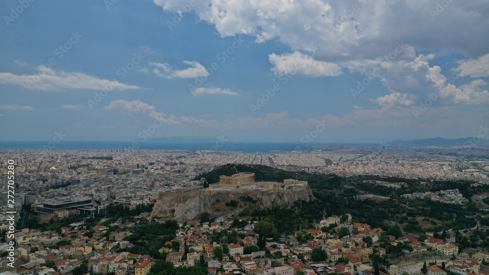Aerial photo of Athens Metropolis urban area and iconic Acropolis hill and the Parthenon, Attica, Greece