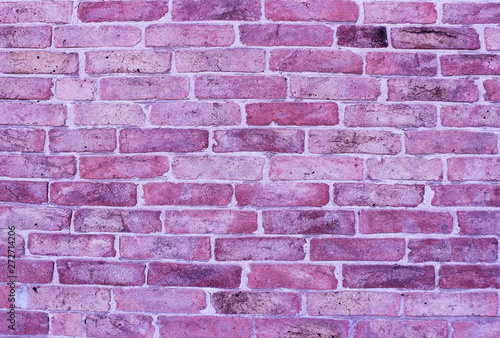 Obraz na płótnie Lilac old brickwork. A snapshot of the wall of an old brick building. w salonie
