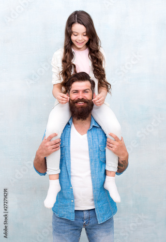 Fun time together. Child and dad best friends. Friendly relations. Fathers day concept. Happy to be father. Father and daughter having fun. Playing with mustache. Celebrate holiday. Cheerful father photo