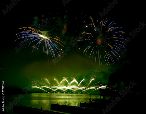 Fireworks fired over the water surface