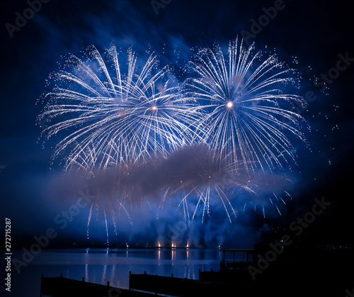 Fireworks fired over the water surface