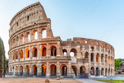 Colosseum, or Coliseum. Illuminated huge Roman amphitheatre early in the morning, Rome, Italy
