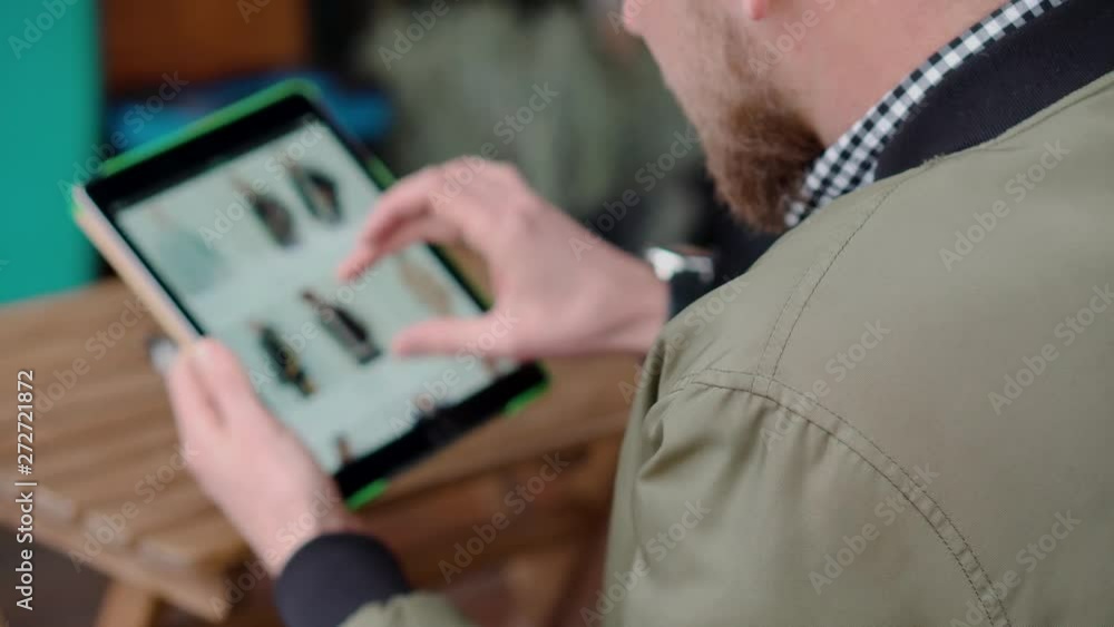 A guy on ecommerce site choosing clothes A guy on ecommerce site choosing clothes