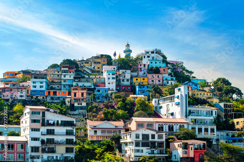 Pintoresco y colorido barrio Las Peñas en el Cerro Santa Ana, con el Faro en su cima. photo