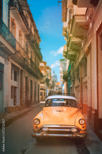 Antique car on a narrow street in Old Havana © kmiragaya