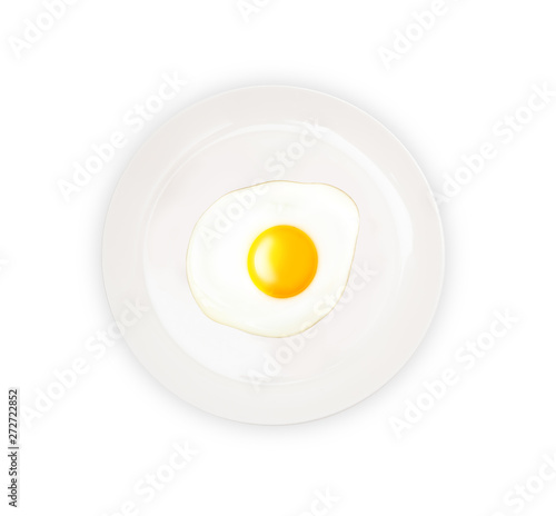 Top view of white dish with fried egg isolated on white