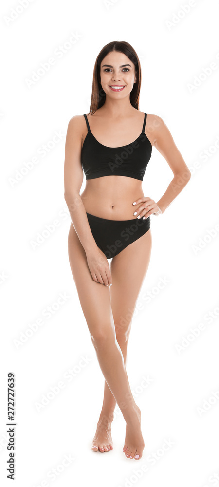 Portrait of a young woman wearing underwear, full length stock