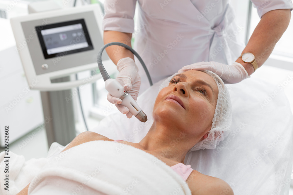 Nice good looking woman having a lifting procedure Nice good looking woman having a lifting procedure